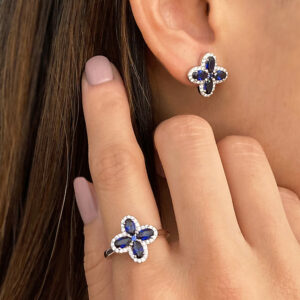 Blue sapphire and diamond cross ring and earrings