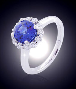 Round Halo engagement ring with round Chatham Blue sapphire