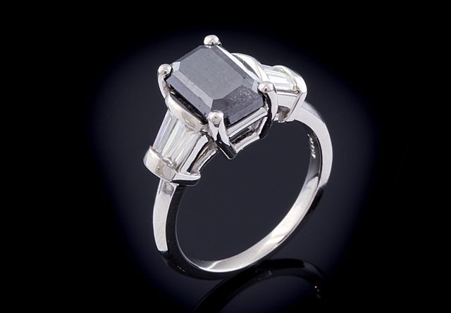 Black diamond and moissanite engagement ring