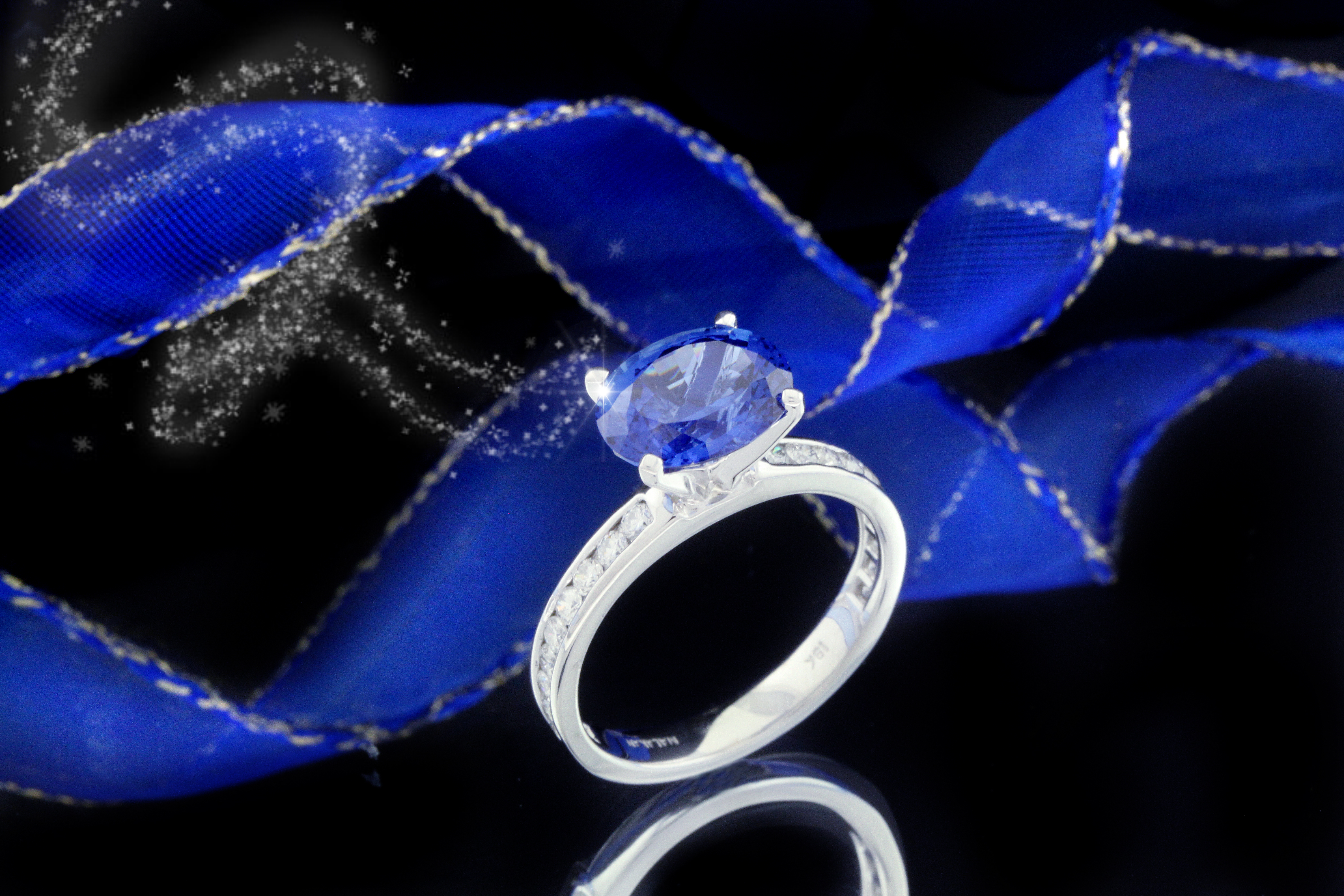 Oval Blue Sapphire And Diamond Engagement Ring